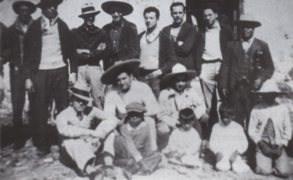 (fig. 2) Reuben Kadish, Philip Guston, and Jules Langsner (left to right, standing without hats) with Mexican friends in Santa Maria, near Morelia, Mexico, 1934. Photo, David McKee Gallery, New York